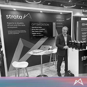 Strata event stand at investops with Tom Tucker